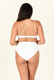 Model against white background showing the back of Apex Top and Bound Bottom in White
